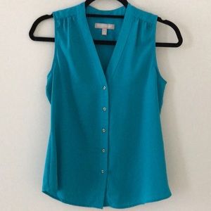 Turquoise sleeveless blouse
